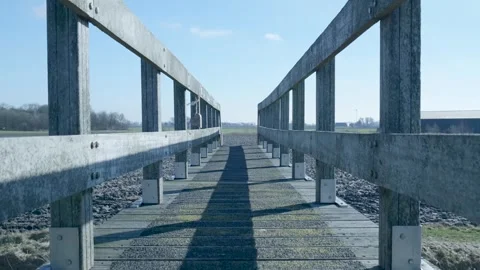 Point of view shot walking under and over a wooden bridge Video stock 331188737