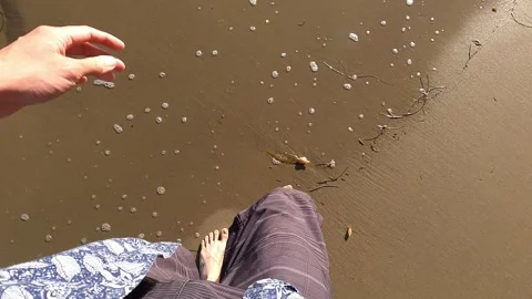 Point of view slow motion shot of footsteps walking along a beach in California Vídeo Stock 251514598