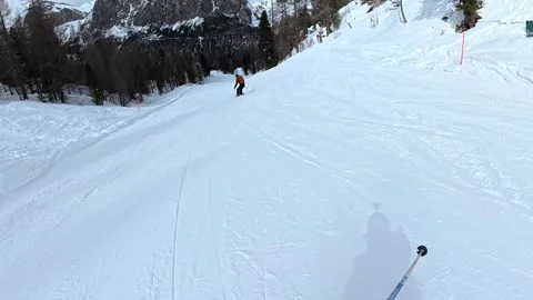 Point of view snowboarding downhill in the dolomites Stock Footage 340624321