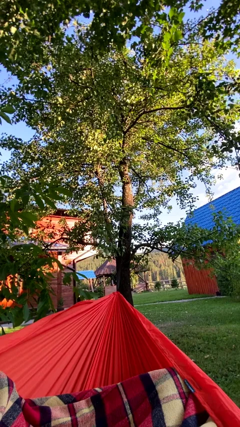 Point of view swinging on hammock Stock Footage 211808754