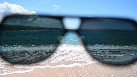 Point of view through sunglasses of idyllic beach with seashore Stock Footage 109061255