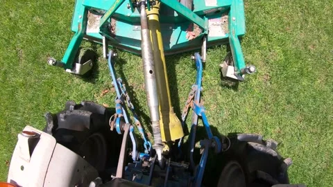 A Point of View of a Tractor Driveshaft and Estate Mower 스톡 동영상 155505181