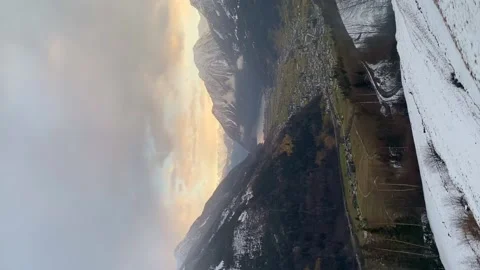 Point of view of train cross mountain and forest. Winter day. Vertical Stock Footage 223982726