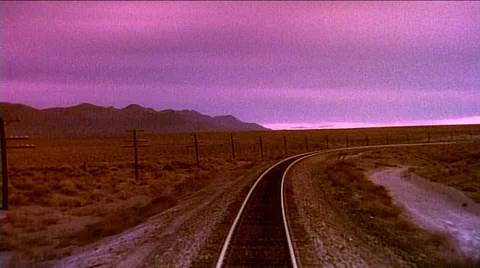 Point of view from train engine train tracks and desert grasslands 스톡 동영상 29806733