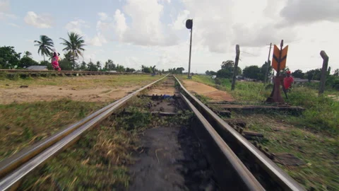 Point Of View Of Train Moving Along Tracks In Africa，Tanzania Stock Footage 131228532