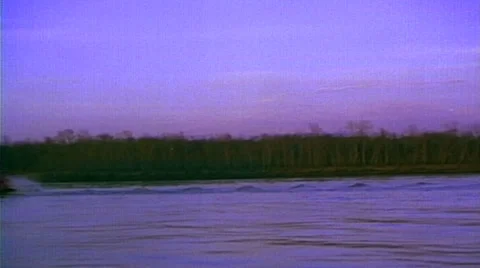 Point of view from train passenger window passing Mississippi riverboat - Stock Footage 29807758