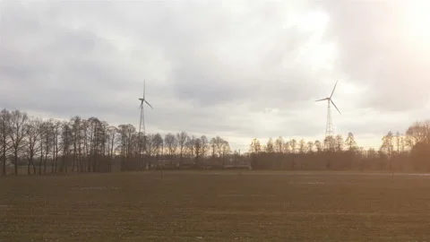 Point of view from train passing windmills in 4k slow motion 60fps Stock Footage 99829272