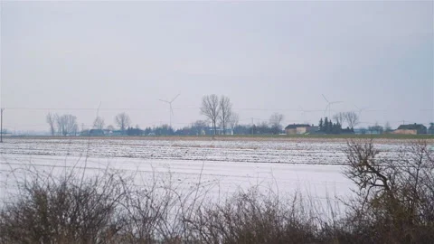 Point of view from train passing windmills in slow motion 180fps Stock Footage 99854236