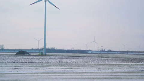 Point of view from train passing windmills in slow motion 180fps Stock Footage 99854545