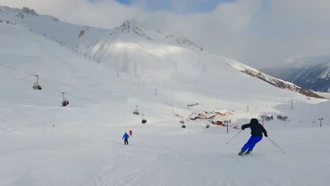 Point of view video of skiers on the slopes of the famous St Moritz ski resort Stock Footage 166742516