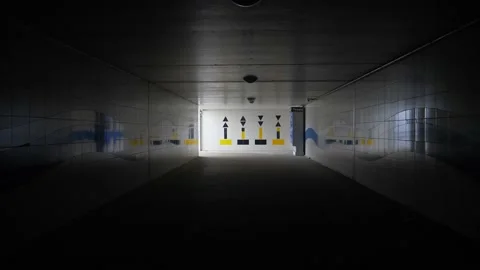 Point of view of walking in empty abandoned tunnel in train station Stockbeeldmateriaal 219346722