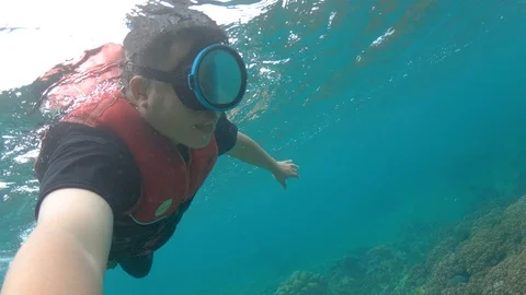 Point of view while man snorkeling Stock Footage 114984436