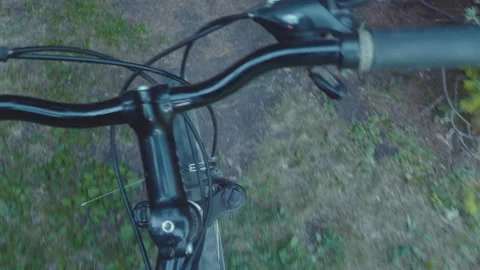 Point of View while riding bicycle on paved trail. Stock Footage 91800528