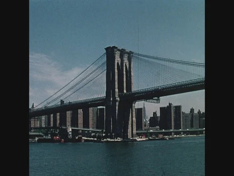 Point of view, wide shot, passing the Brooklyn Bridge from the East River on the Video stock 82547218