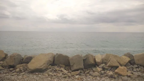 Point of view from the window of moving automobile on seascape at cloudy day Stock Footage 306657921
