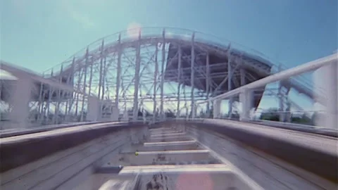 Point of view of wooden roller coaster speeding into a tunnel. Video stock 168147282