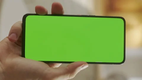 Point of View of Young Man at Home Sitting on Kitchen Room using With Green Mock Stock Footage 170763801