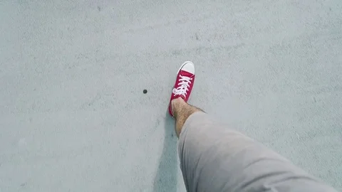 POINT OF VIEW: young man walking at the street - slow motion Stock Footage 80514208