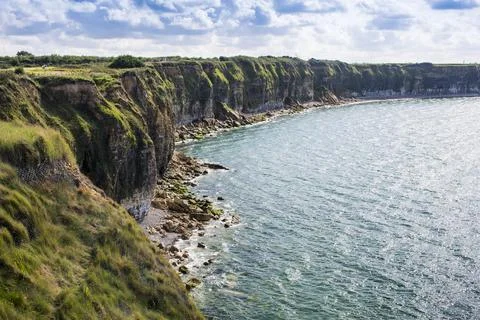 Pointe du Hoc Cliff. Pointe du Hoc s a promontory with a 100 ft (30 m) clif.. Stock Photos