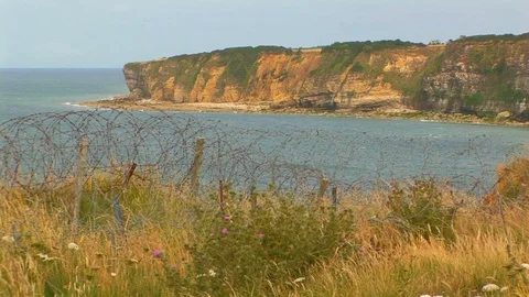 Pointe du Hoc cliffs with English Channel in background. Normandy France Stock Footage 104223499