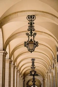 Pointed arch ceiling with ornate lighting in Lisbon, Portugal Stock Photos