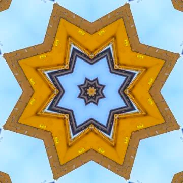 A pointed star shape made from a yellow tractor Stock Photos