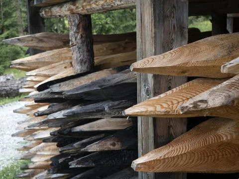 Pointed wood logs pattern inside hut Stock Photos