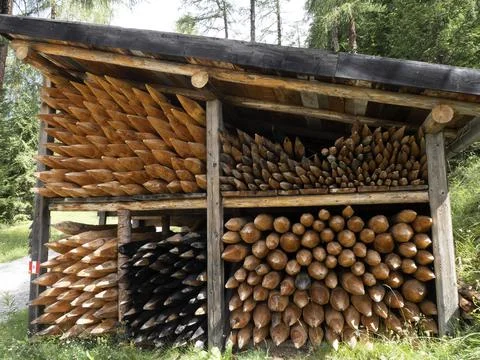 Pointed wood logs pattern inside hut Stock Photos