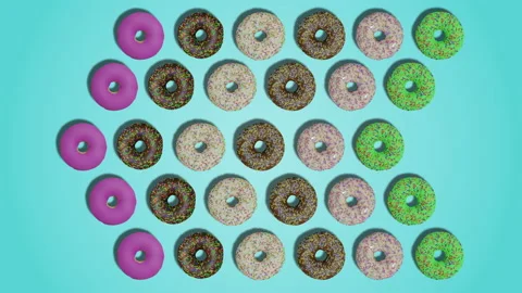 Pointer arrow made of delicious donuts, icing and sprinkles on cyan background Stock Footage 194654956
