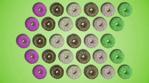 Pointer arrow made of glazed and sprinkled delicious donuts on green background Stock Footage 194655242