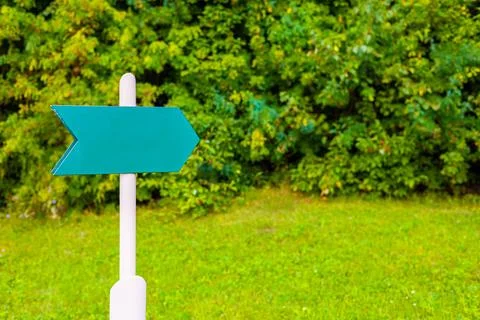 Pointer with an arrow without an inscription in the park Stock Photos