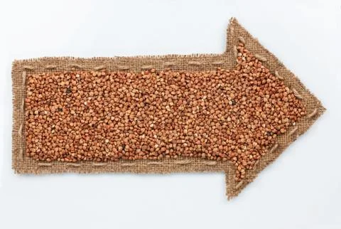 Pointer with buckwheat grains Stock Photos