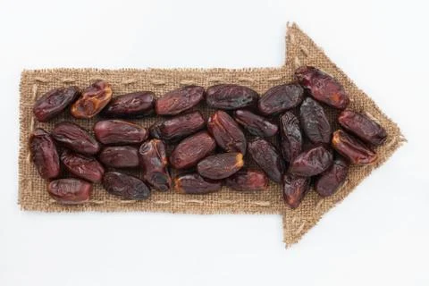 Pointer of  burlap with dried  date Stock Photos