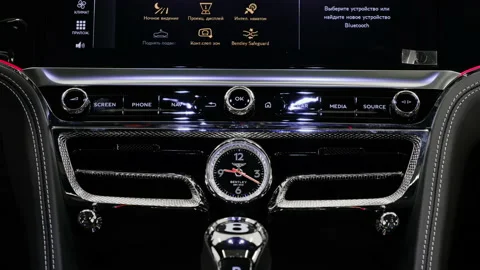 The pointer clock on the dashboard of the new Bentley Flying Spur W12  Video stock 148128564