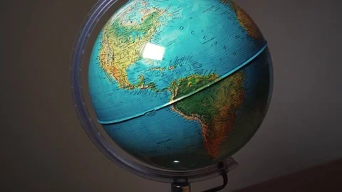 Pointer finger on the globe Vídeo Stock 70779929