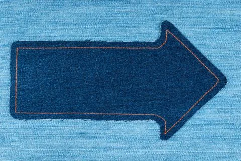 Pointer made of denim fabric with yellow stitching on denim Stock Photos