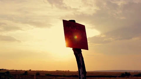 A pointer to mark dangerous areas on the field at sunset. 動画素材 66543950