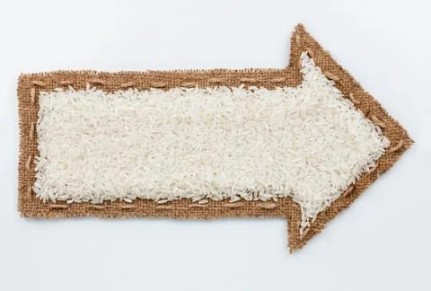 Pointer with rice grains Stock Photos
