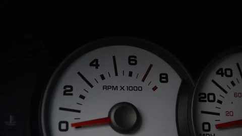 The pointer of the tachometer while starting the engine Video stock 128415979