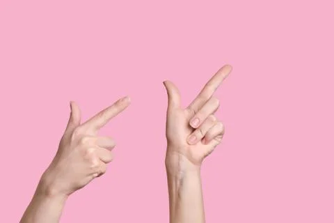 Pointer up. Two Caucasian hands indicate the direction up, above, high. Stock Photos