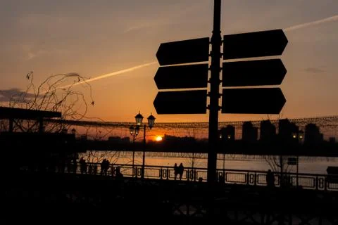 A pointer to the waterfront at sunset Foto stock