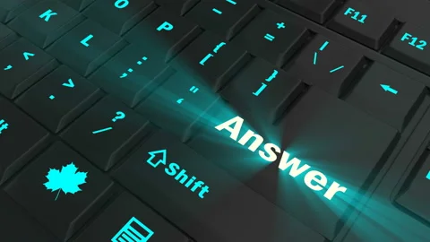 Pointing on blue glowing Answer key Stock Footage 100607264