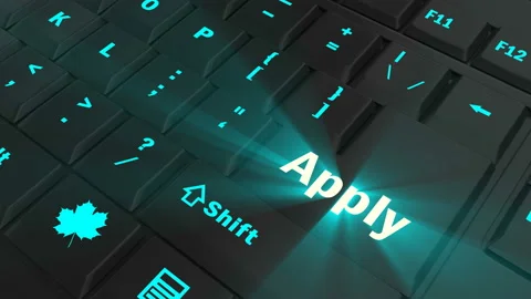 Pointing on blue glowing Apply key Stock Footage 100607340