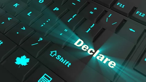 Pointing on blue glowing Declare key Stock Footage 100607719