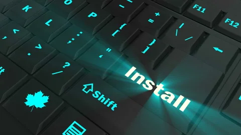 Pointing on blue glowing Install key Stock Footage 100561936