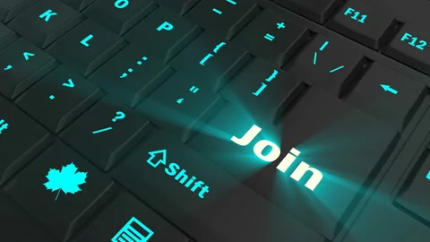 Pointing on blue glowing Join key Stock Footage 100582474