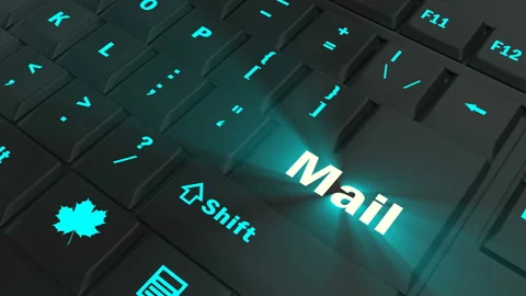 Pointing on blue glowing Mail key Stock Footage 100636758