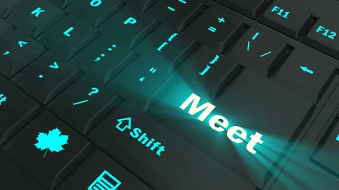 Pointing on blue glowing Meet key Stock Footage 100608356