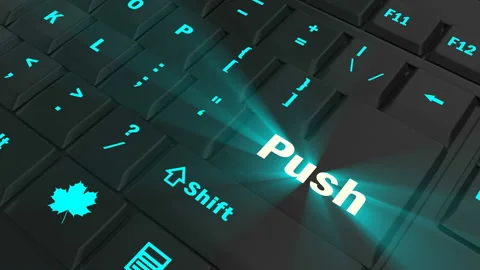 Pointing on blue glowing Push key Stock Footage 100608787