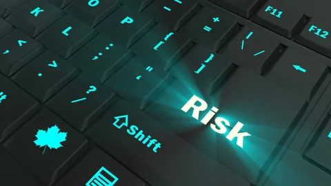 Pointing on blue glowing Risk key Stock Footage 100637428